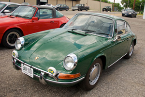 Irish Green Porsche 912 in a parking space.