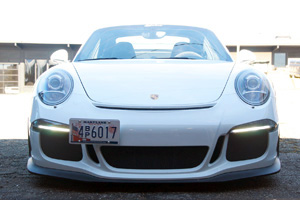 Front profile view of the 991 GT3 in the parking lot with contrasting light