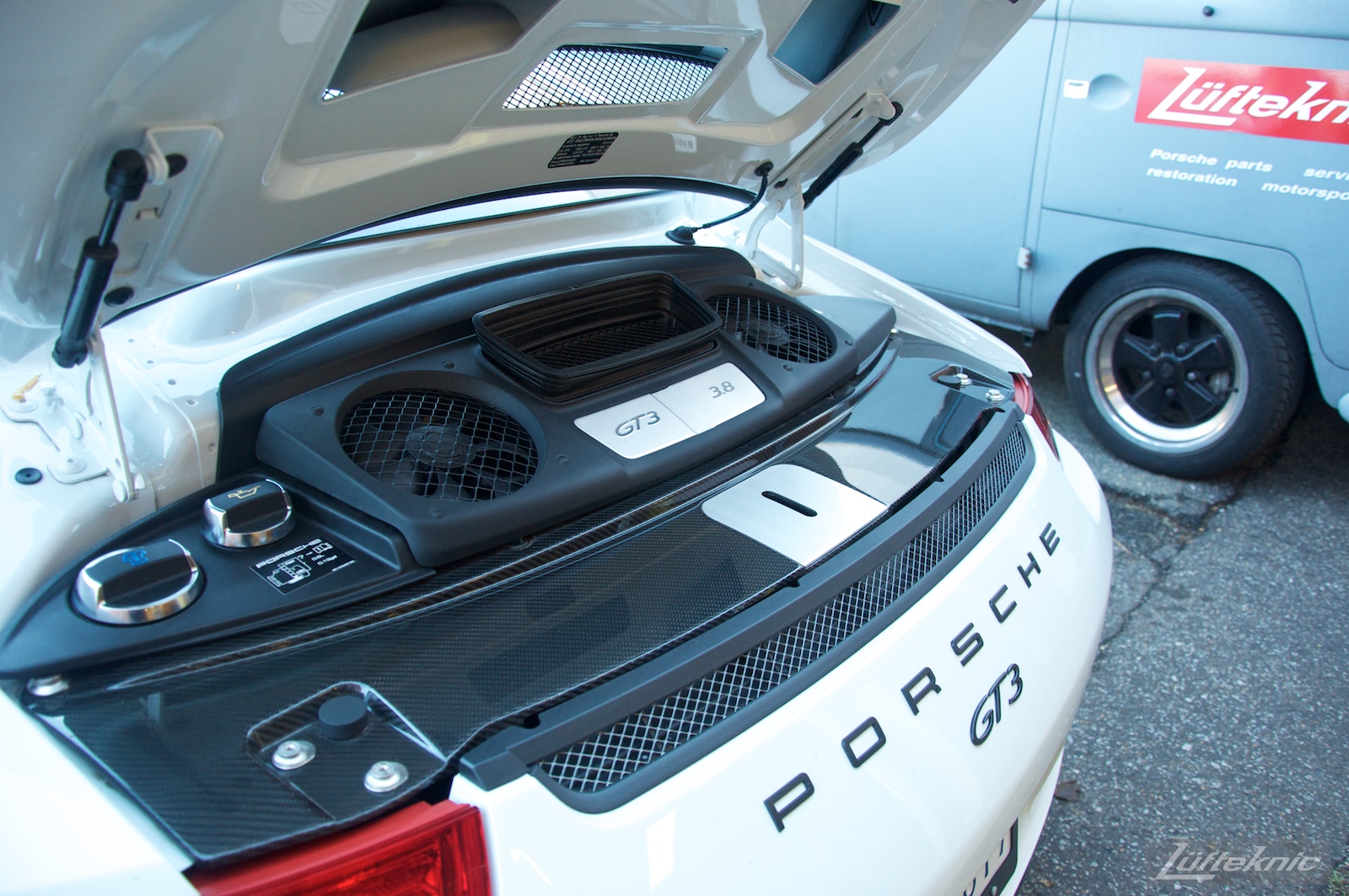 An open rear engine cover just shows fans and fluid caps on the Lüfteknic Porsche 991 GT3