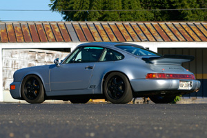 A rear 3/4 shot of a race ready 964 RS America