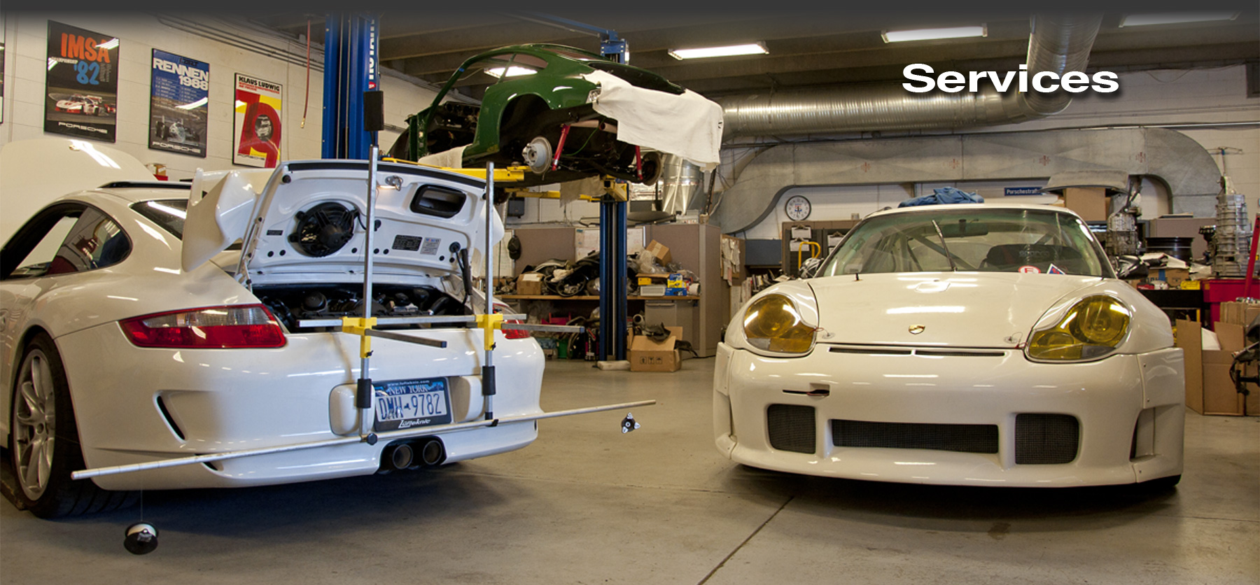 Lüfteknic services header showing a 997 GT3, 912 and 996 RSR being worked on inside Lüfteknic.