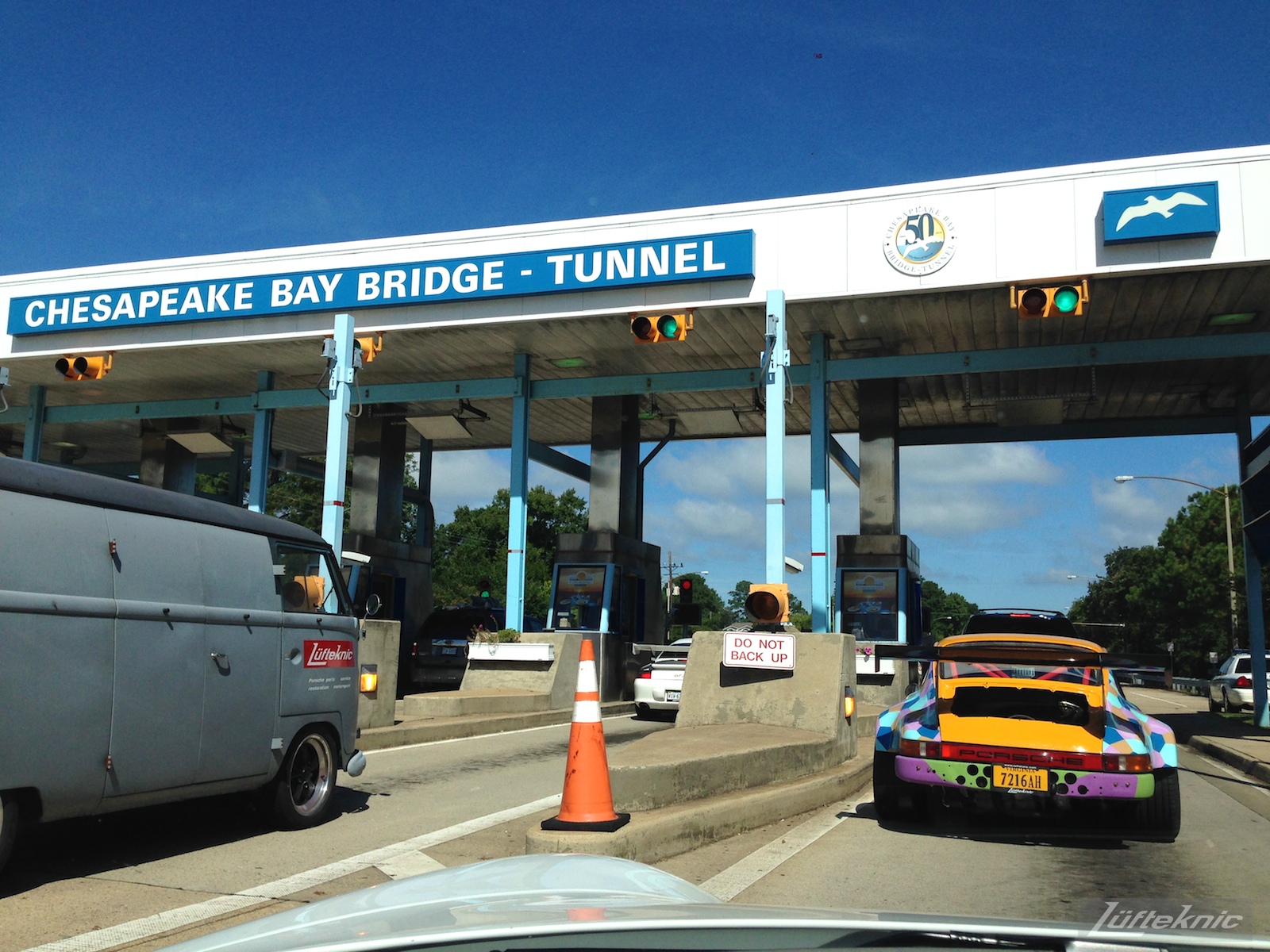 The Lüfteknic #projectstuka Porsche 930 Turbo and porschebus paying the toll at the Chesapeake bay bridge tunnel.