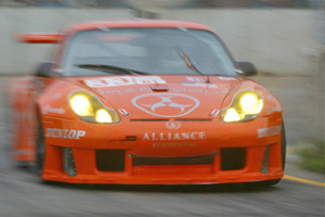 A blurred picture of the Hazardous Sports Porsche GT3 Rs in orange