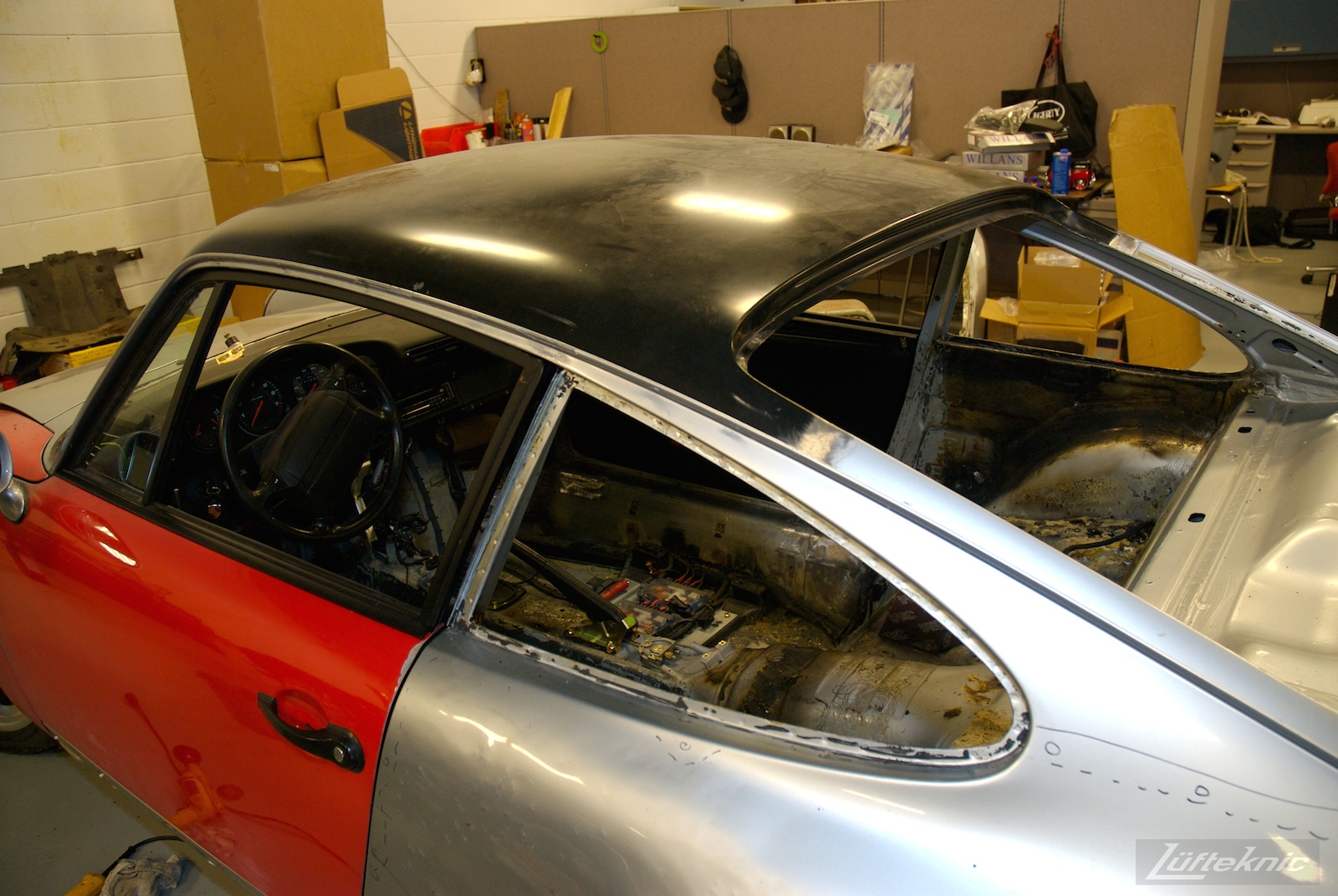 A brand new roof installed onto a wrecked Porsche 964 RS America
