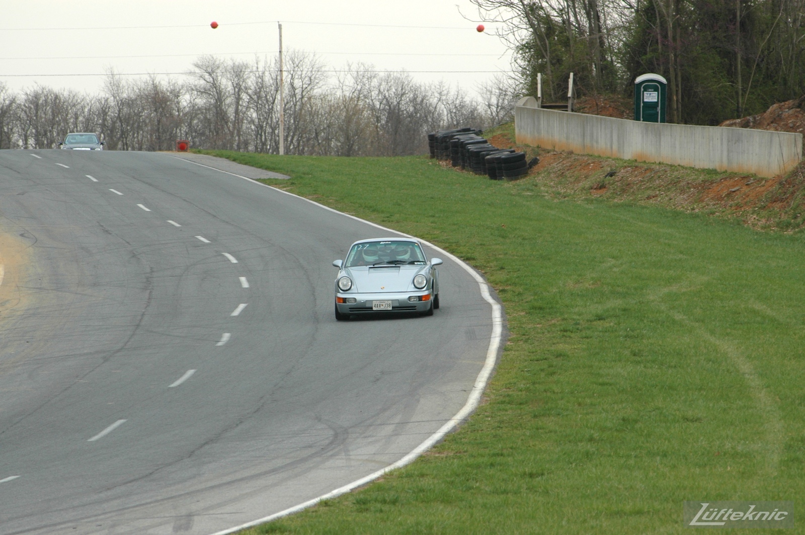 The 964 RS America on track for the first time after the accident, going down the hill at Summit Point