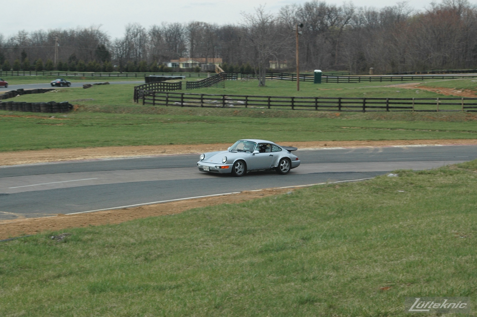 The 964 RS America on track for the first time after the accident going around a left hand corner.