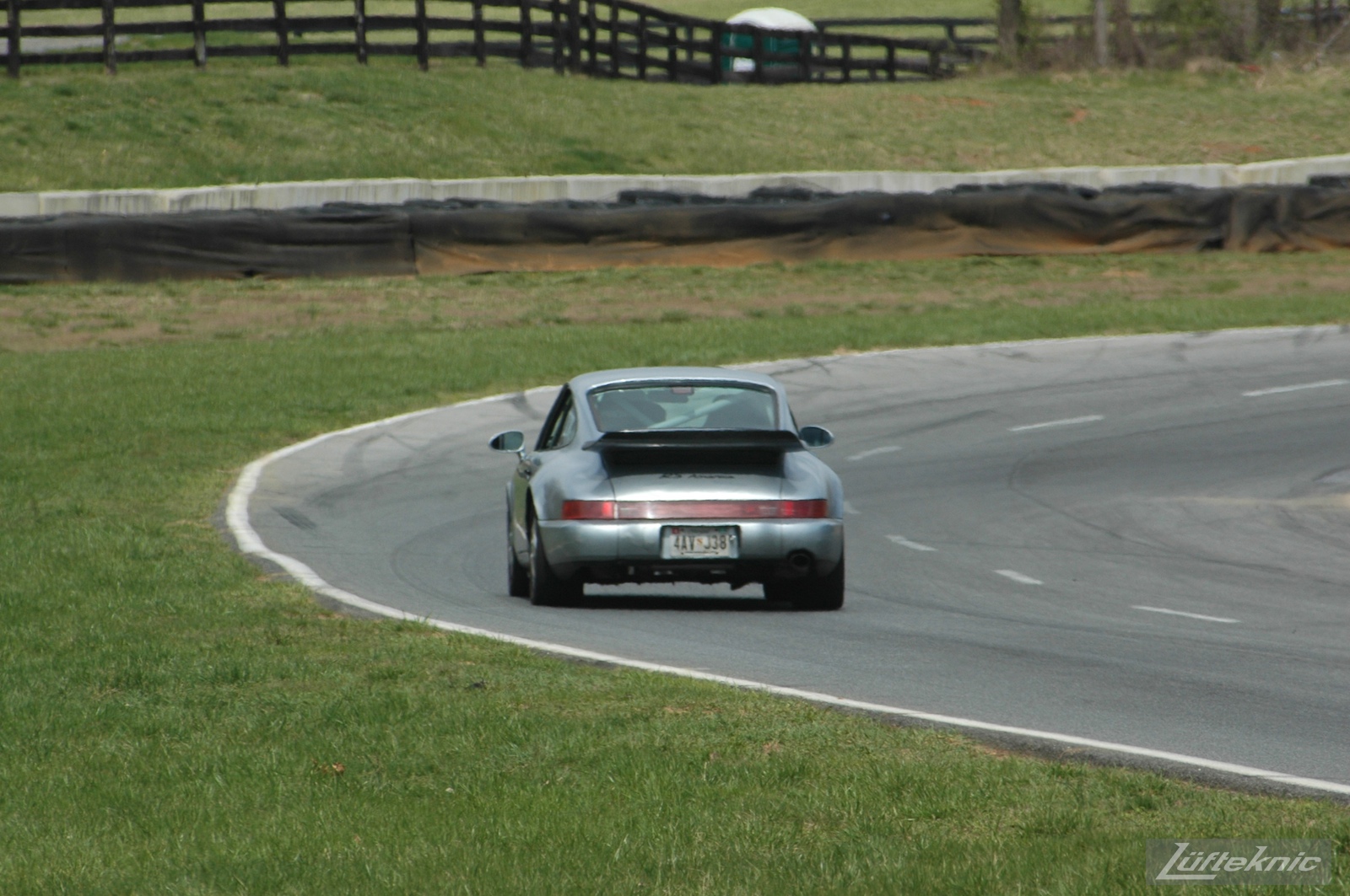 The 964 RS America on track for the first time after the accident, going down the hill at Summit Point