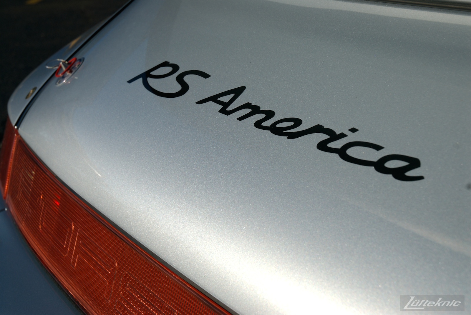 RS America graphics painted onto the rear decklid.