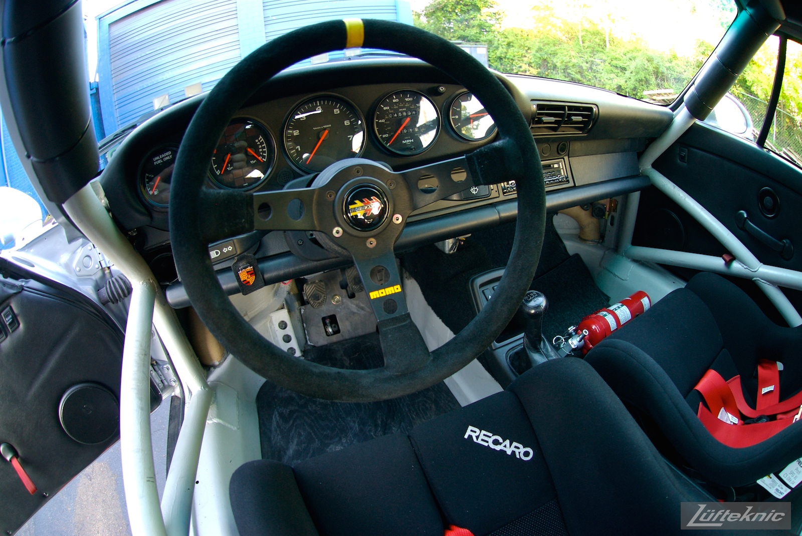 Track prepped Porsche 964 RS America Momo steering wheel.