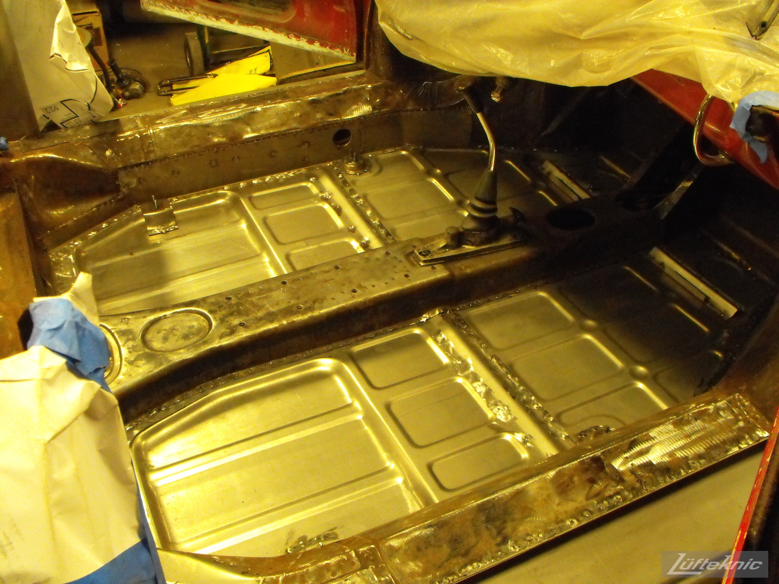 New floors spot welded and installed into a 1961 Porsche 356B Roadster restoration.