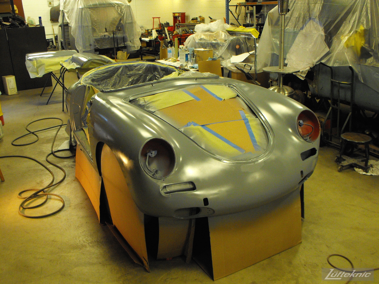 Primered body on a 1961 Porsche 356B Roadster restoration.