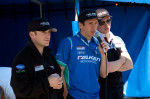 Bryan Sellers, Wolf Henzler and Patrick Pilet of Team Falken Tire talking to fans at Sebring Raceway.