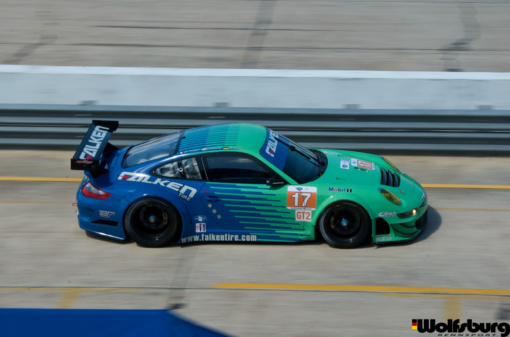 The iconic teal and blue Falken Tire Porsche 911 RSR at Sebring raceway.