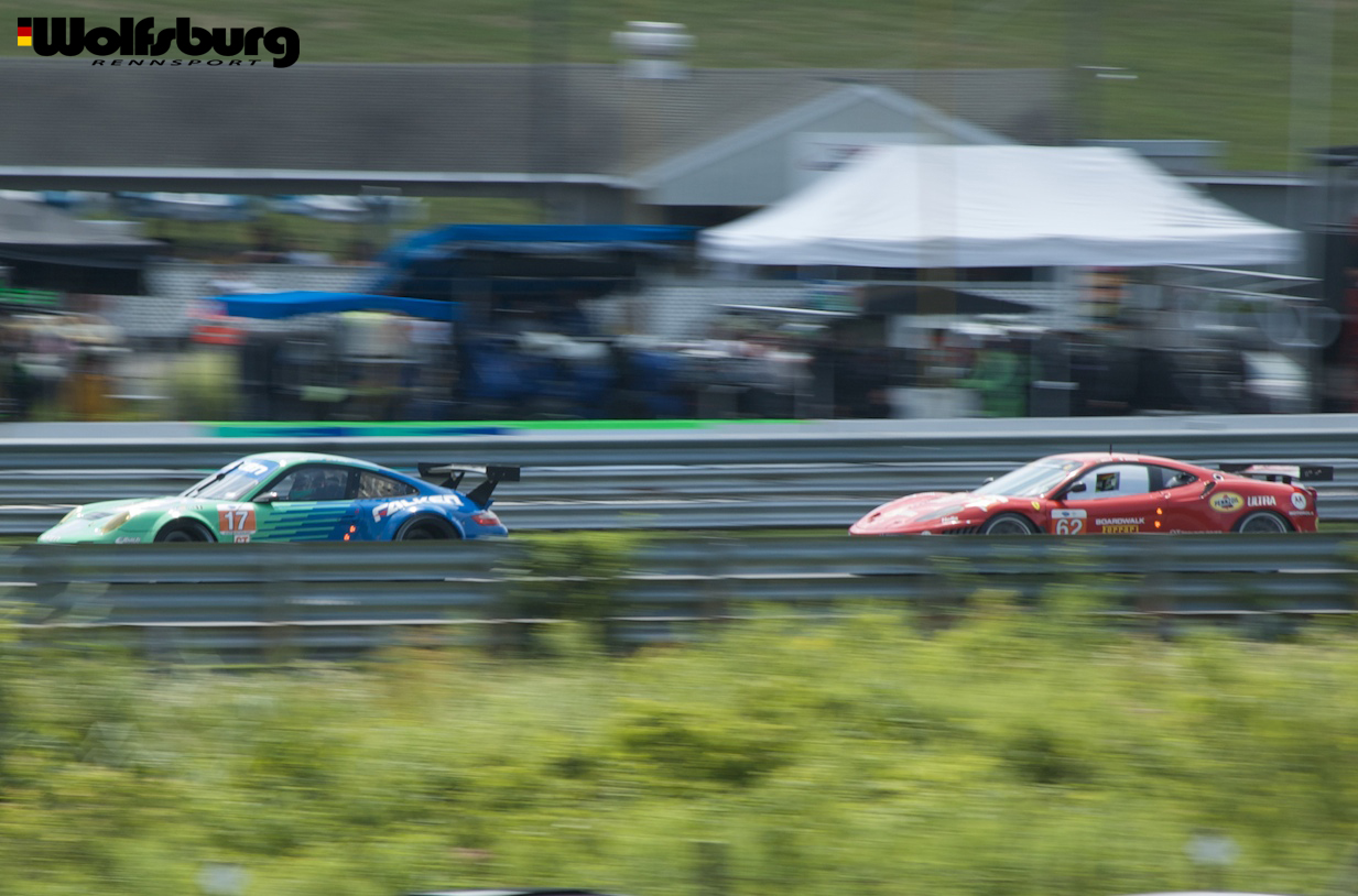 The iconic teal and blue Falken Tire Porsche 911 RSR at Lime Rock Park