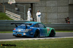 The iconic teal and blue Falken Tire Porsche 911 RSR at Lime Rock Park