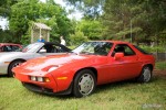 A red 928 at the Richmond Porsche Meet.