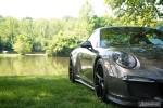 A gray 991 Gt3 next to the james river at the Richmond Porsche Meet.