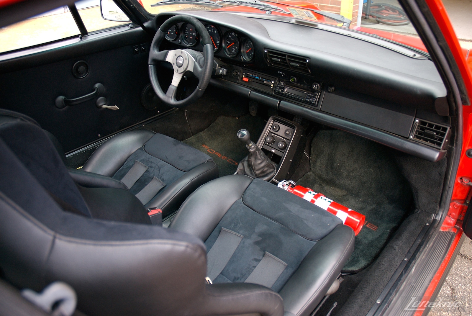 Red Porsche 930 Turbo interior.