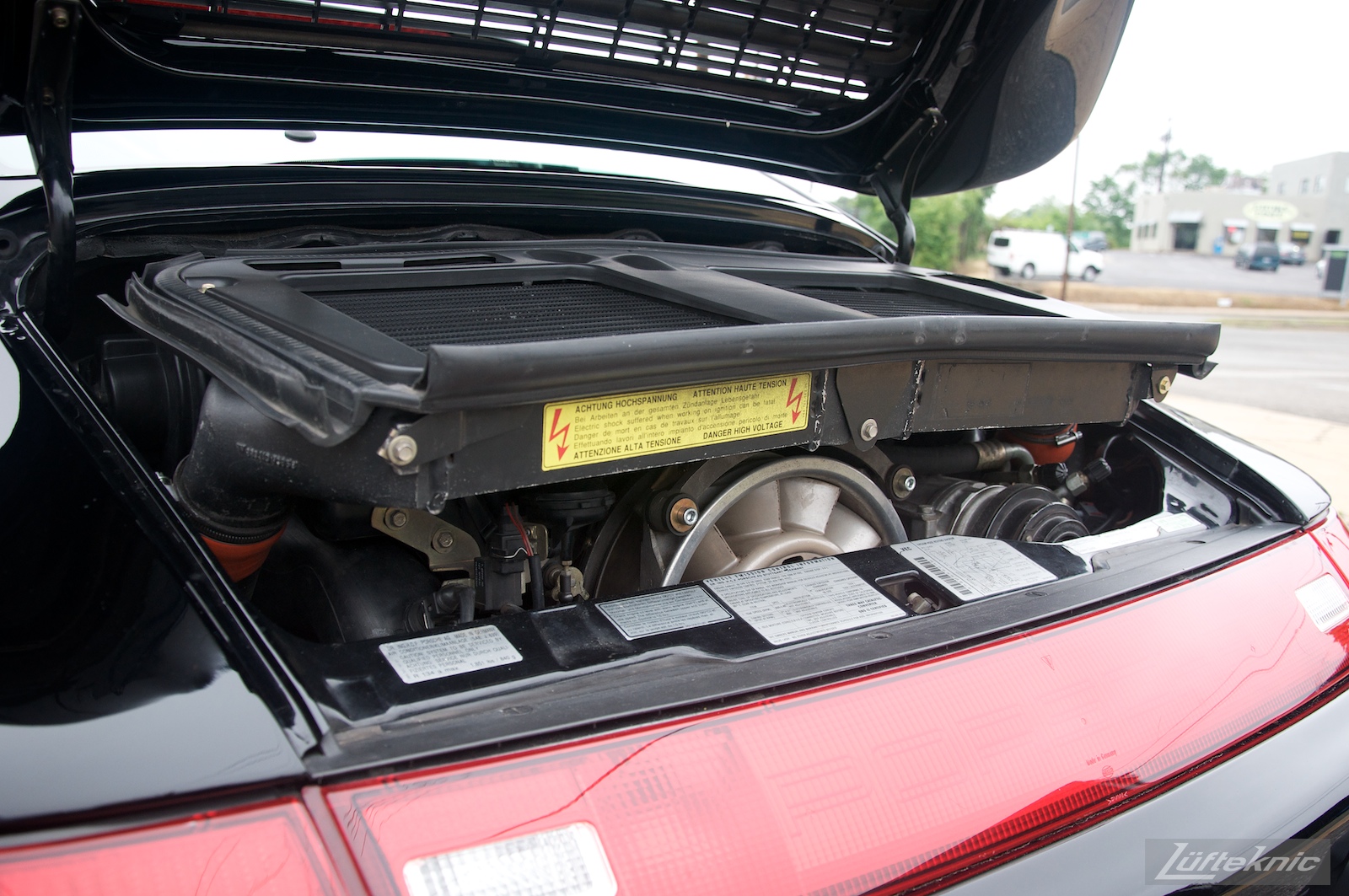A 993 Turbo with the decklid open showing the large intercoolers.