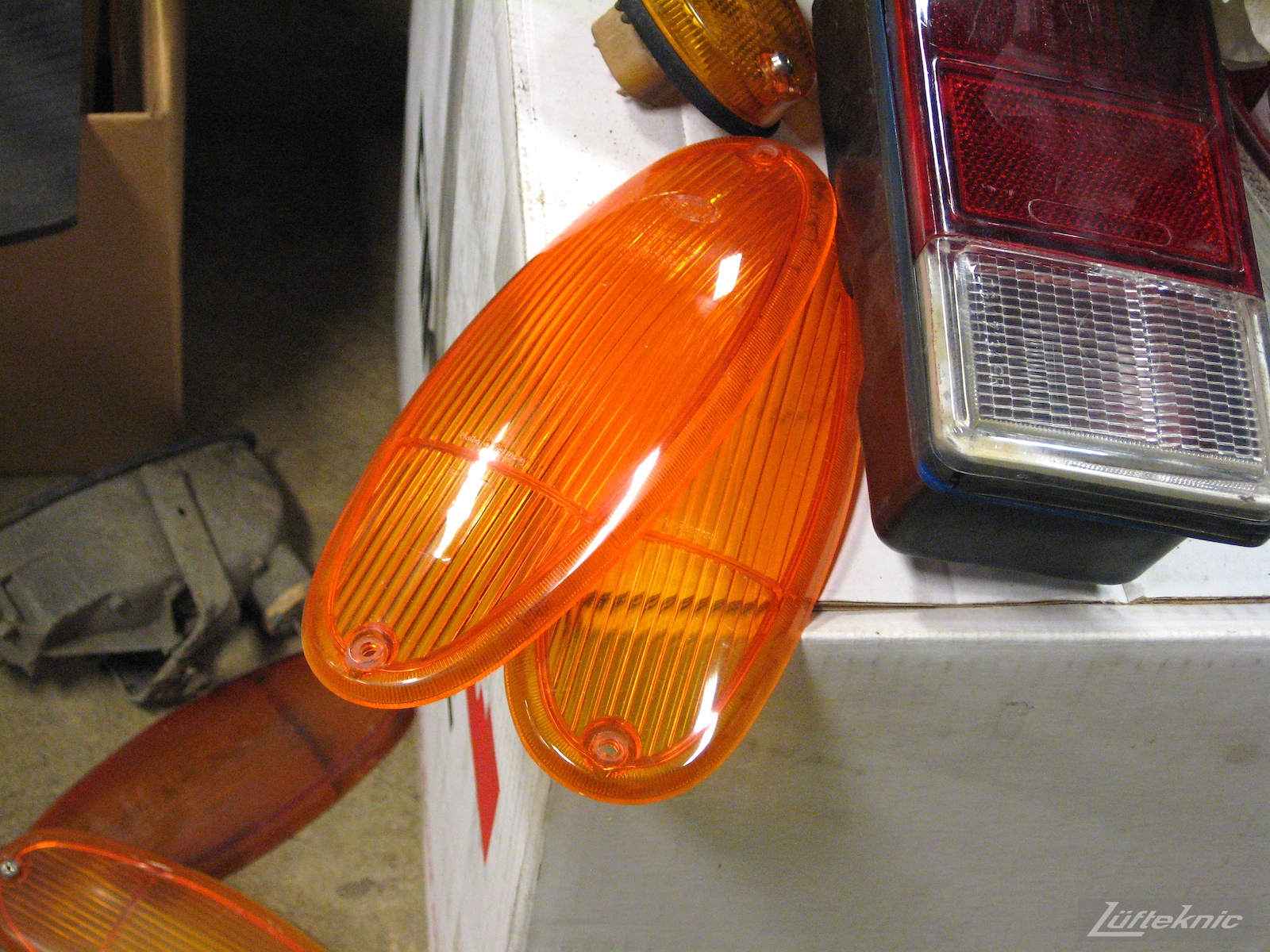 Detailed picture of fresh 914 lights prior to install on a car being restored by Lufteknic.