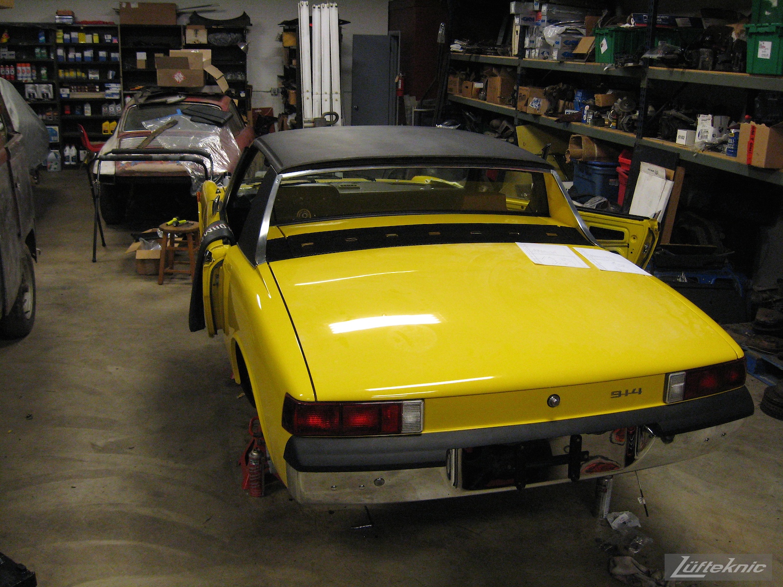 New top and nearly complete restored yellow Porsche 914 at Lufteknic.