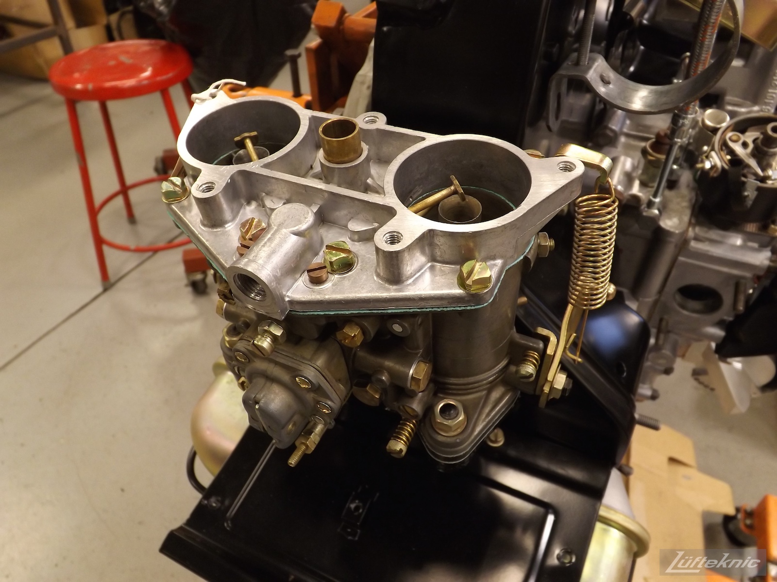 Rebuild carburetors for an Irish Green Porsche 912 undergoing restoration at Lufteknic.