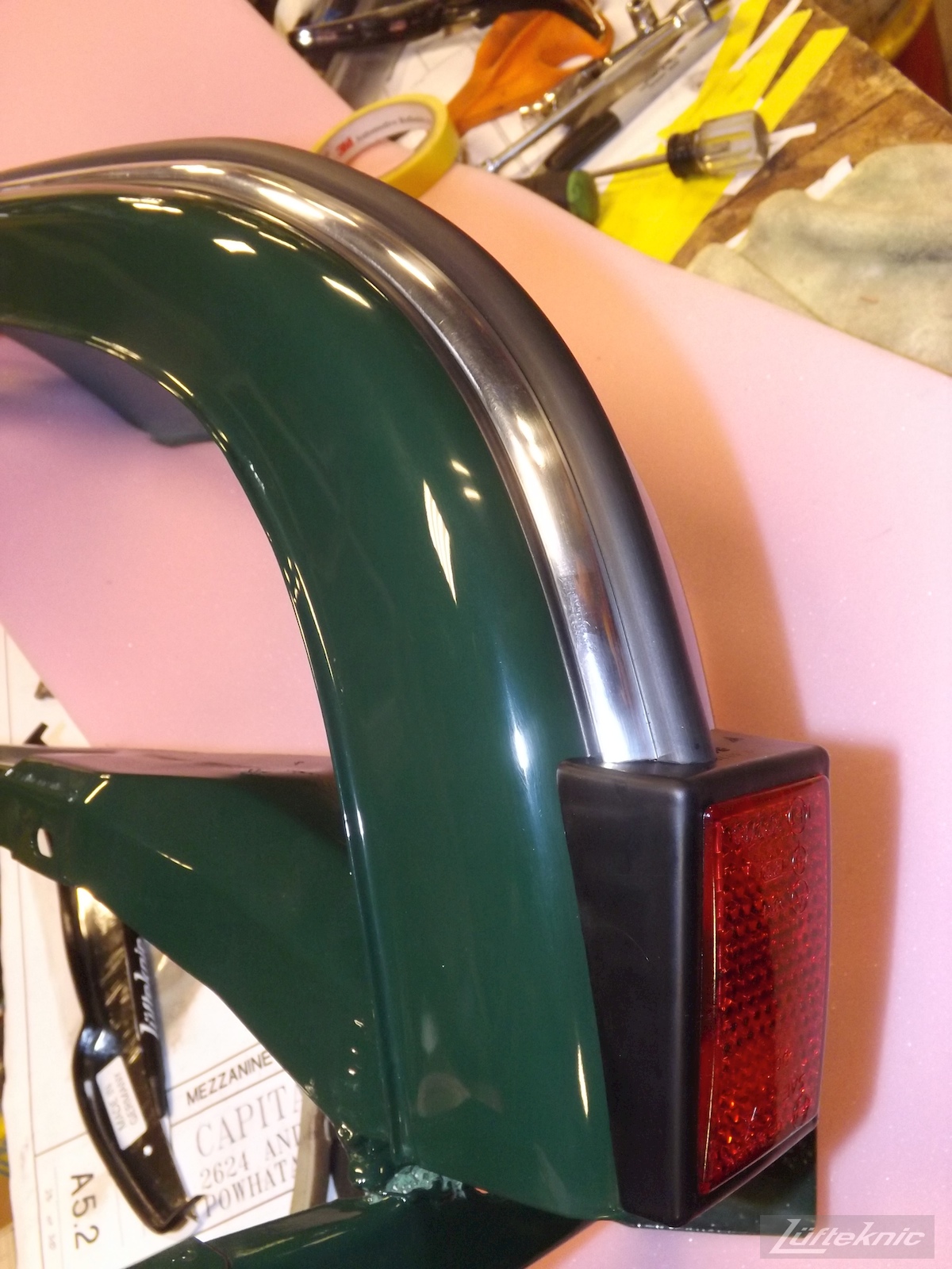 Refinished rear bumper part for an Irish Green Porsche 912 undergoing restoration at Lufteknic.