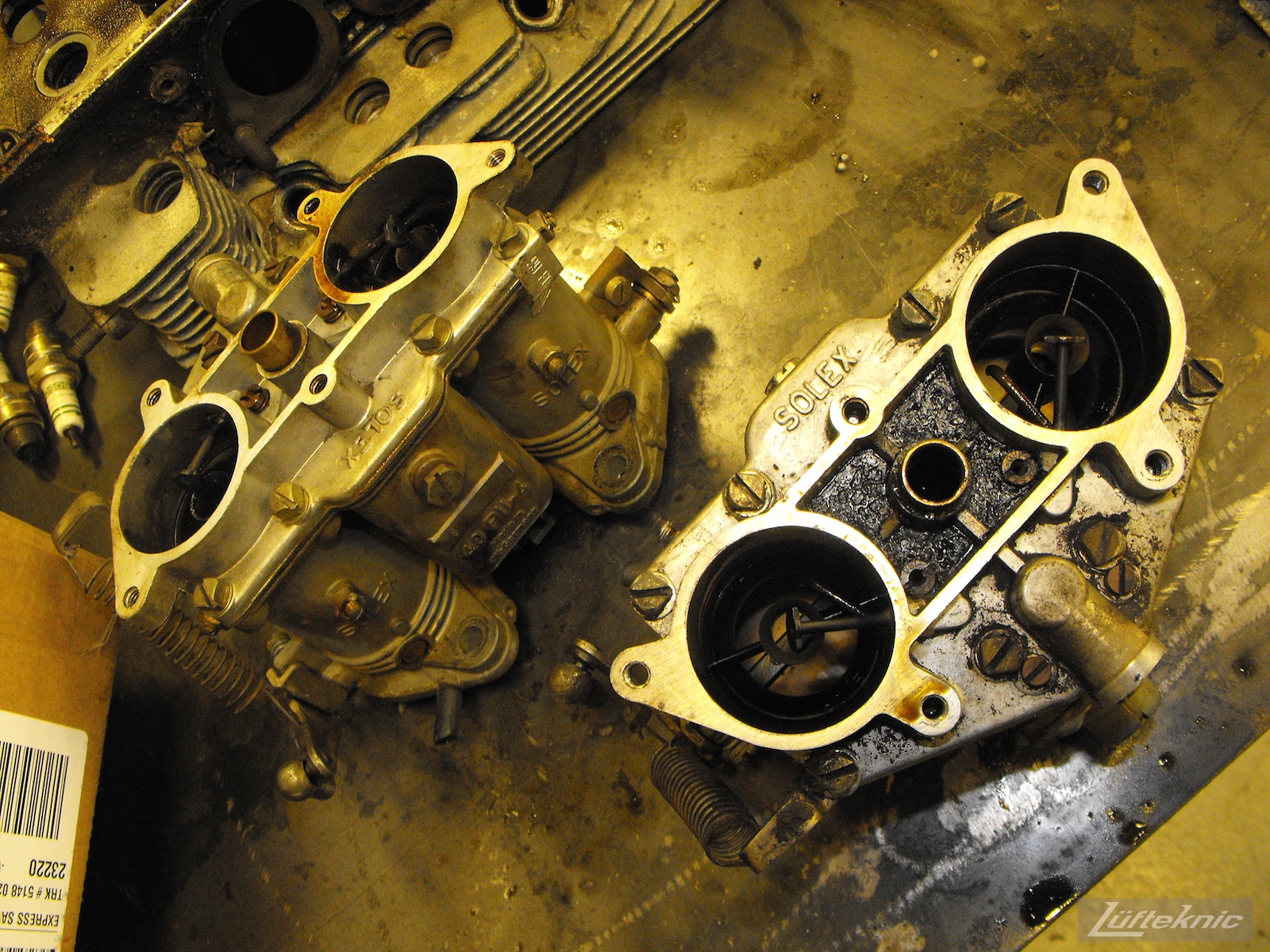 Dirty carburetors from an Irish Green Porsche 912 undergoing restoration at Lufteknic.