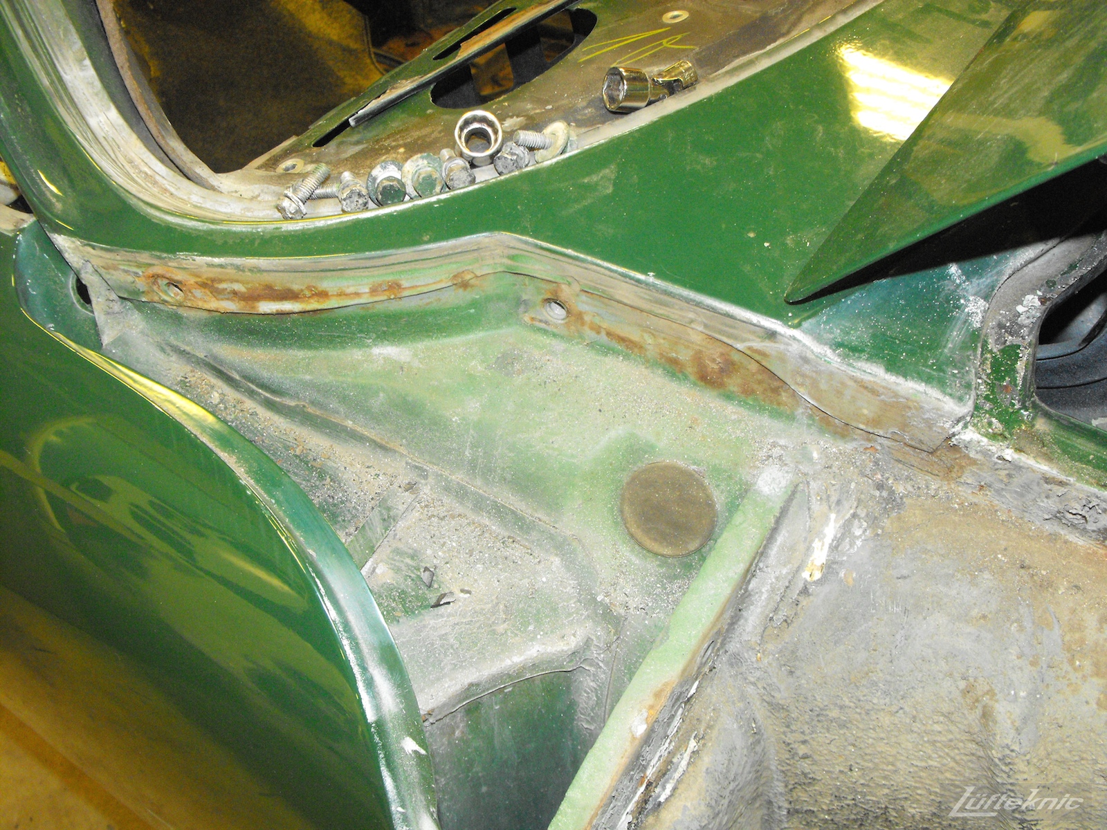 Front chassis age on an Irish Green Porsche 912 undergoing restoration at Lufteknic.