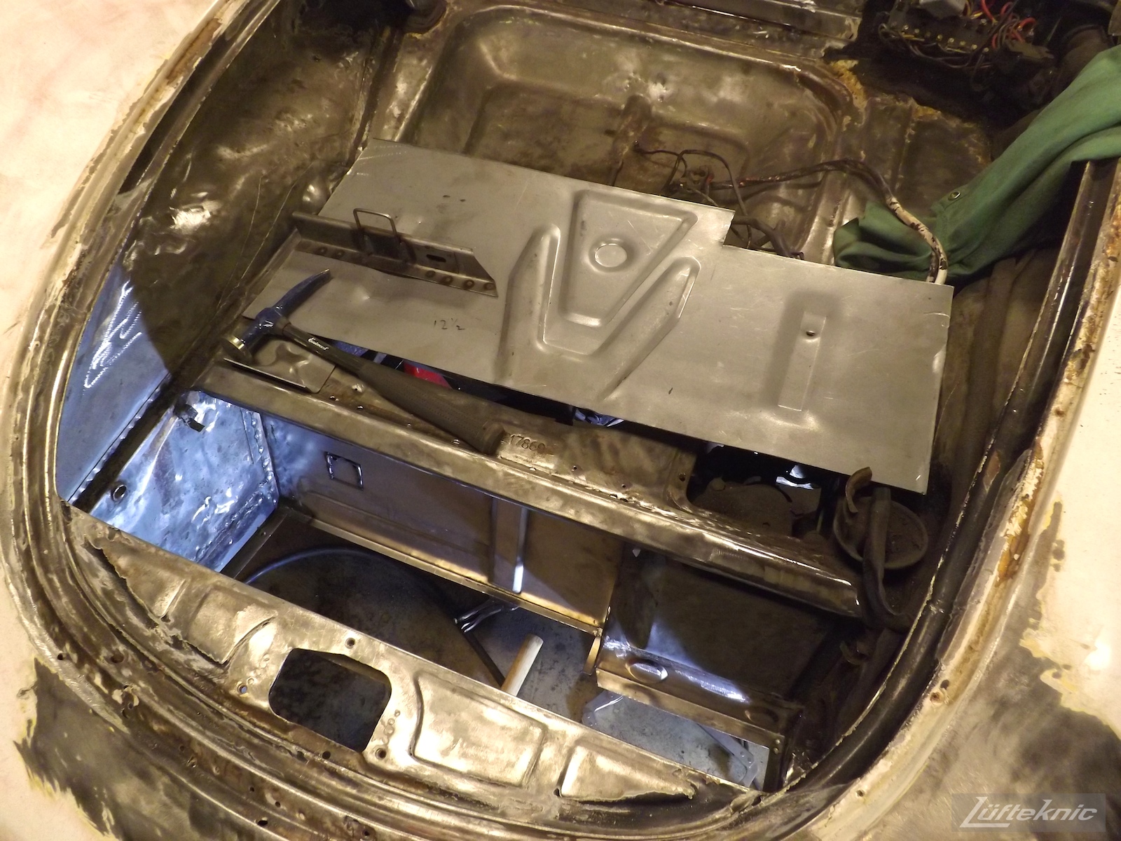 New trunk metal for a White 1964 Porsche 356SC being restored.