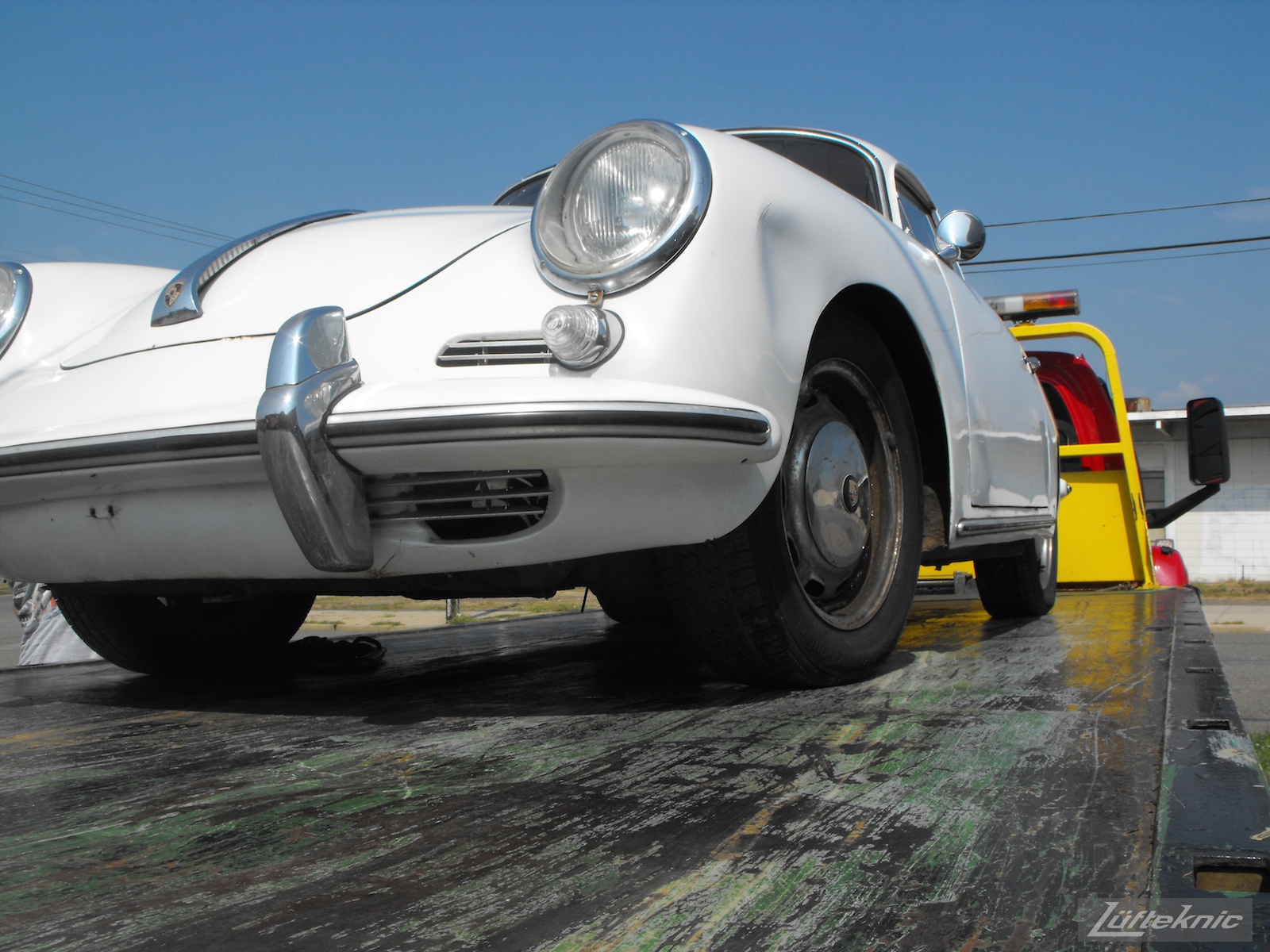 1964 Porsche 356SC restoration being towed in.